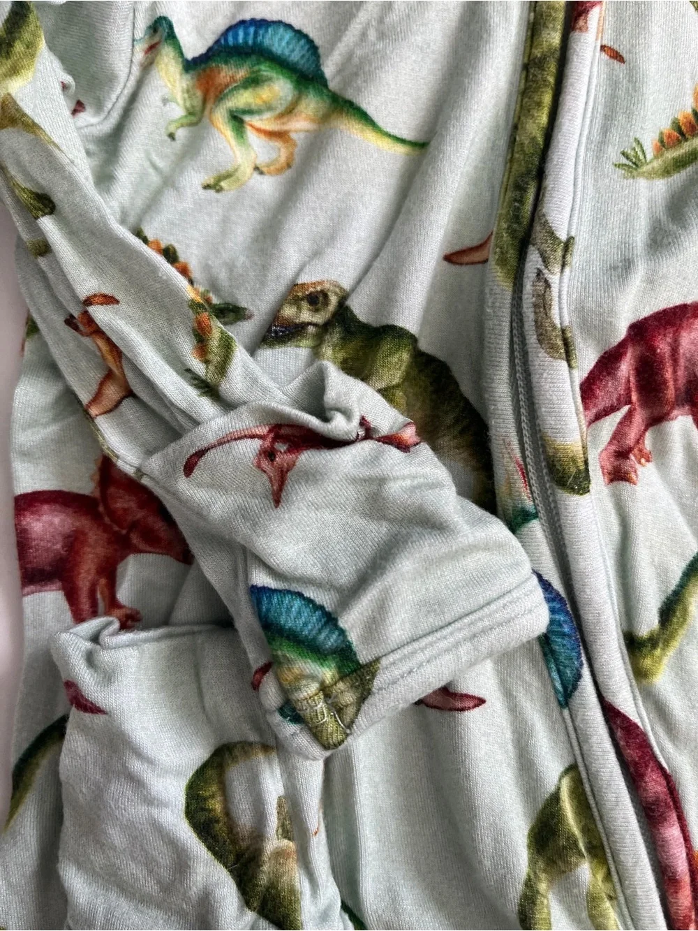 Posh Peanut Mint Dinosaur Print Footed Pajamas with Multicolor Dinosaurs